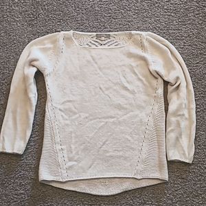 Women's sweater. Cream color with knitting detail on back